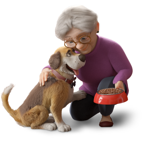 An elderly woman feeding her dog
